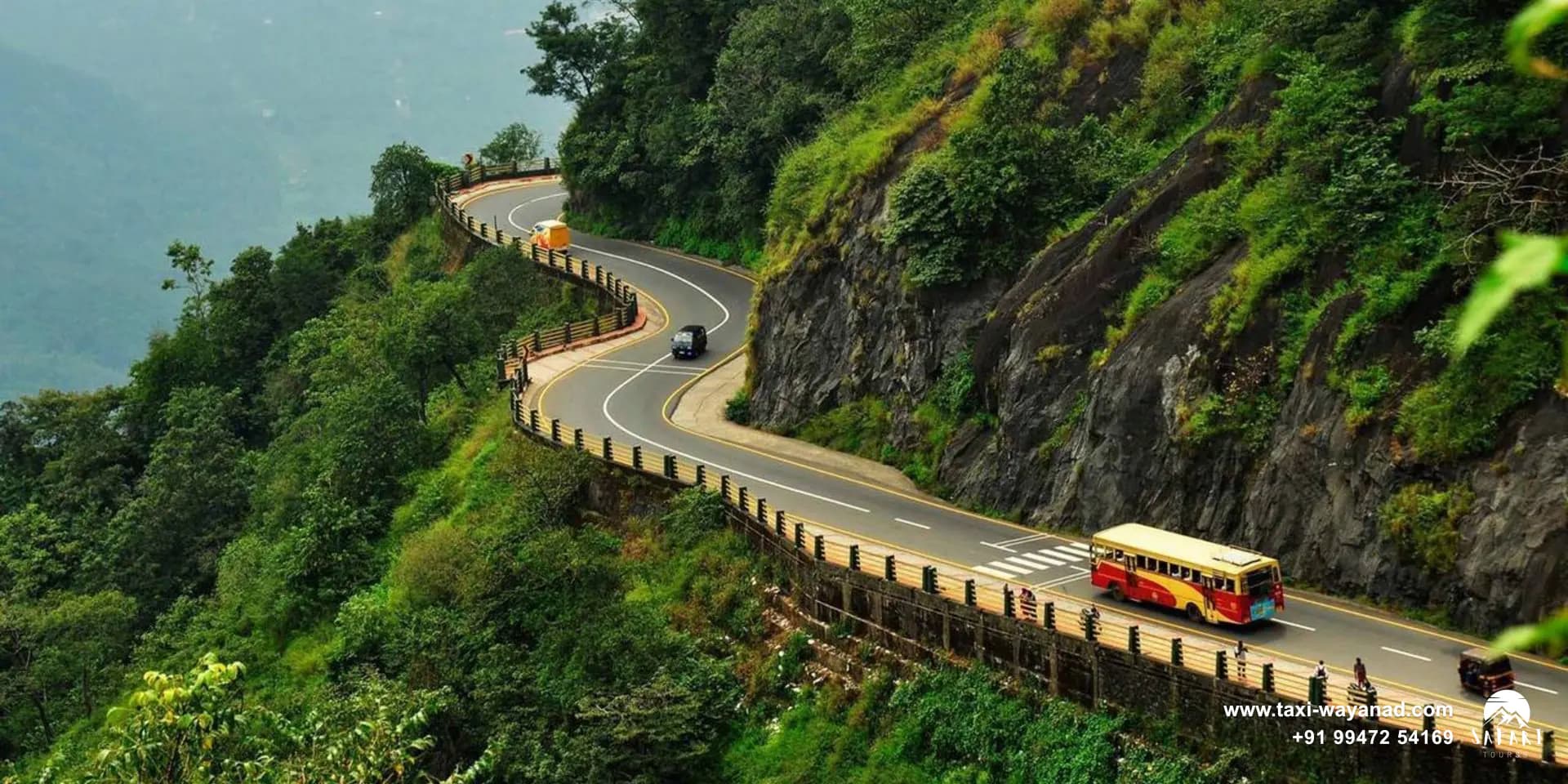 Bus climbing the winding Thamarassery Ghat road to Wayanad through forested hills