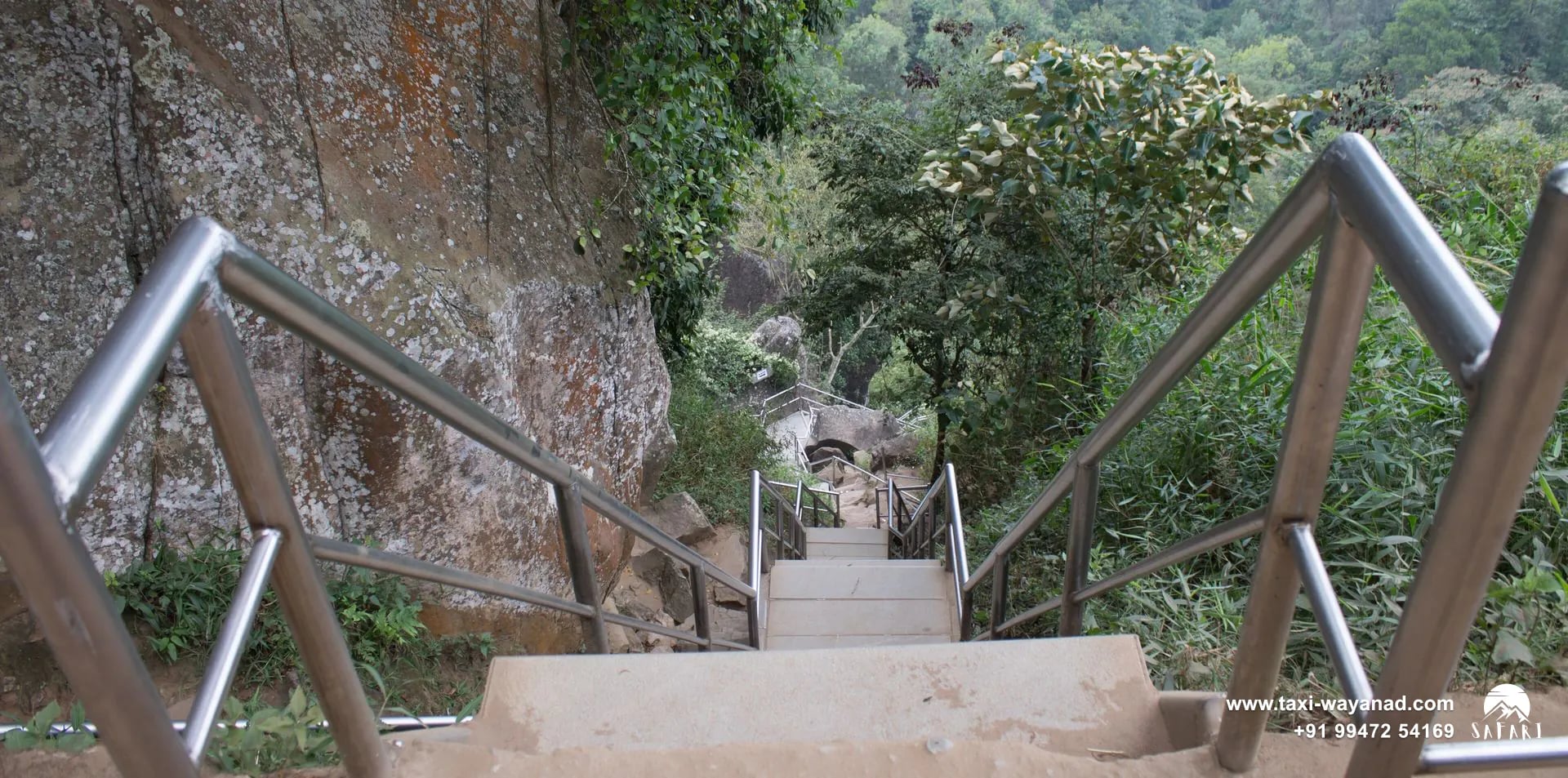 Railed steps leading down the hillside from Edakkal Caves, Wayanad