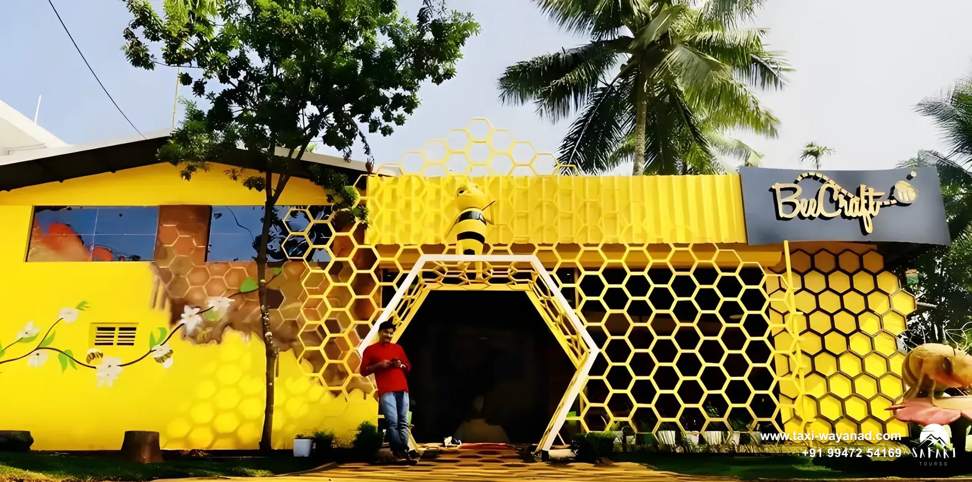 Yellow honeycomb facade of the BeeCraft honey museum, Wayanad