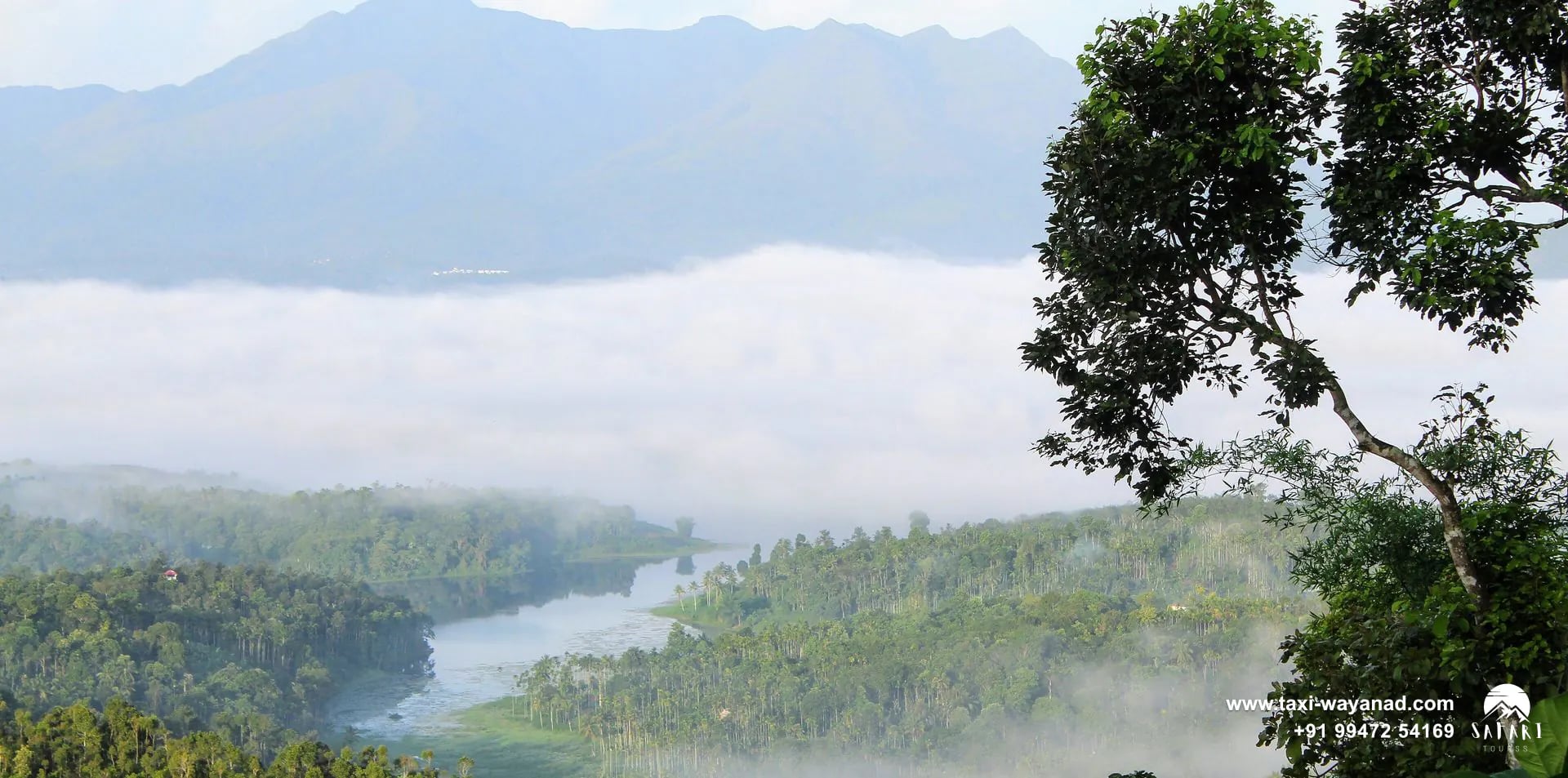 Morning mist over the forested arms of the Karapuzha Dam reservoir, Wayanad