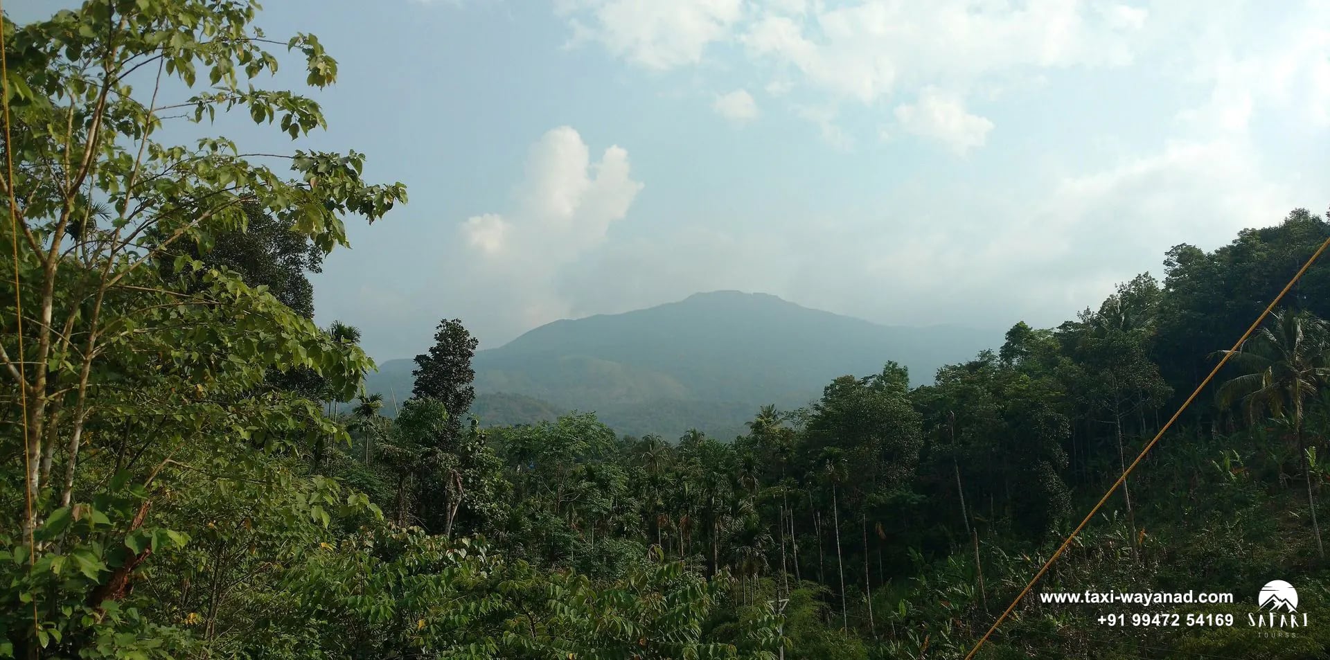 Forested hills and mountains seen from Karlad Lake, Wayanad