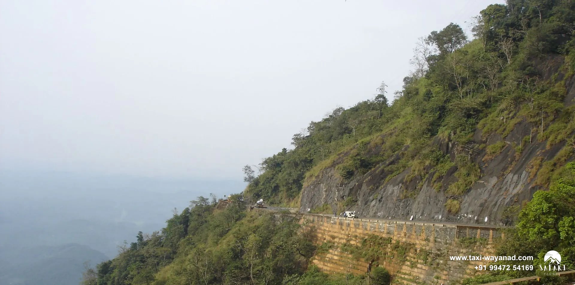 The ghat road cut into a steep hillside near Lakkidi, Wayanad