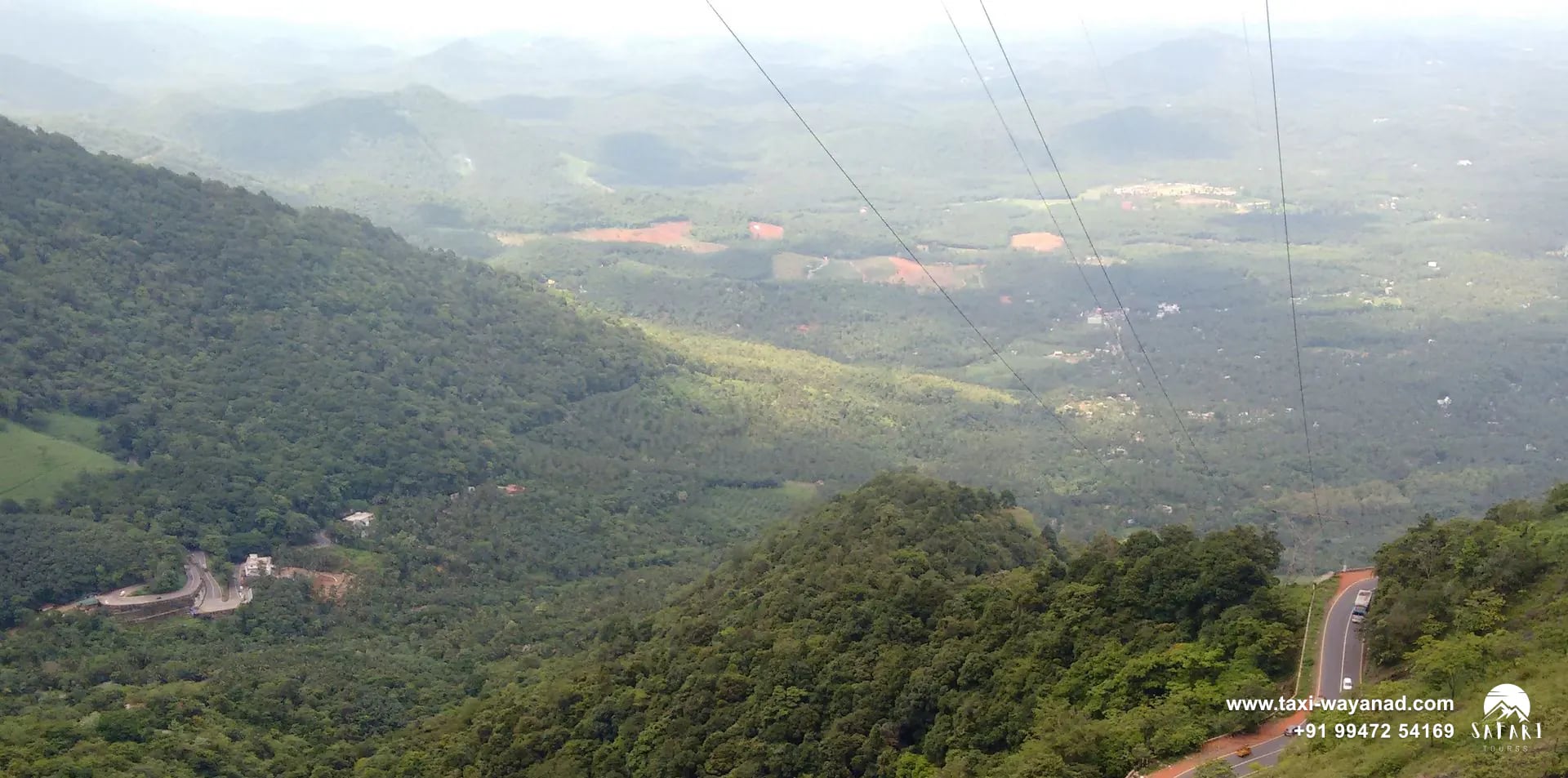 The Thamarassery ghat road climbing a forested slope below Lakkidi View Point, Wayanad