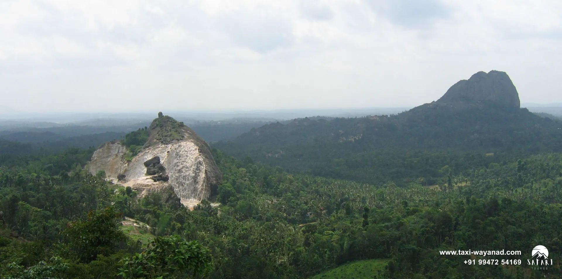 View of quarried granite hills and green plantations from Phantom Rock, Wayanad