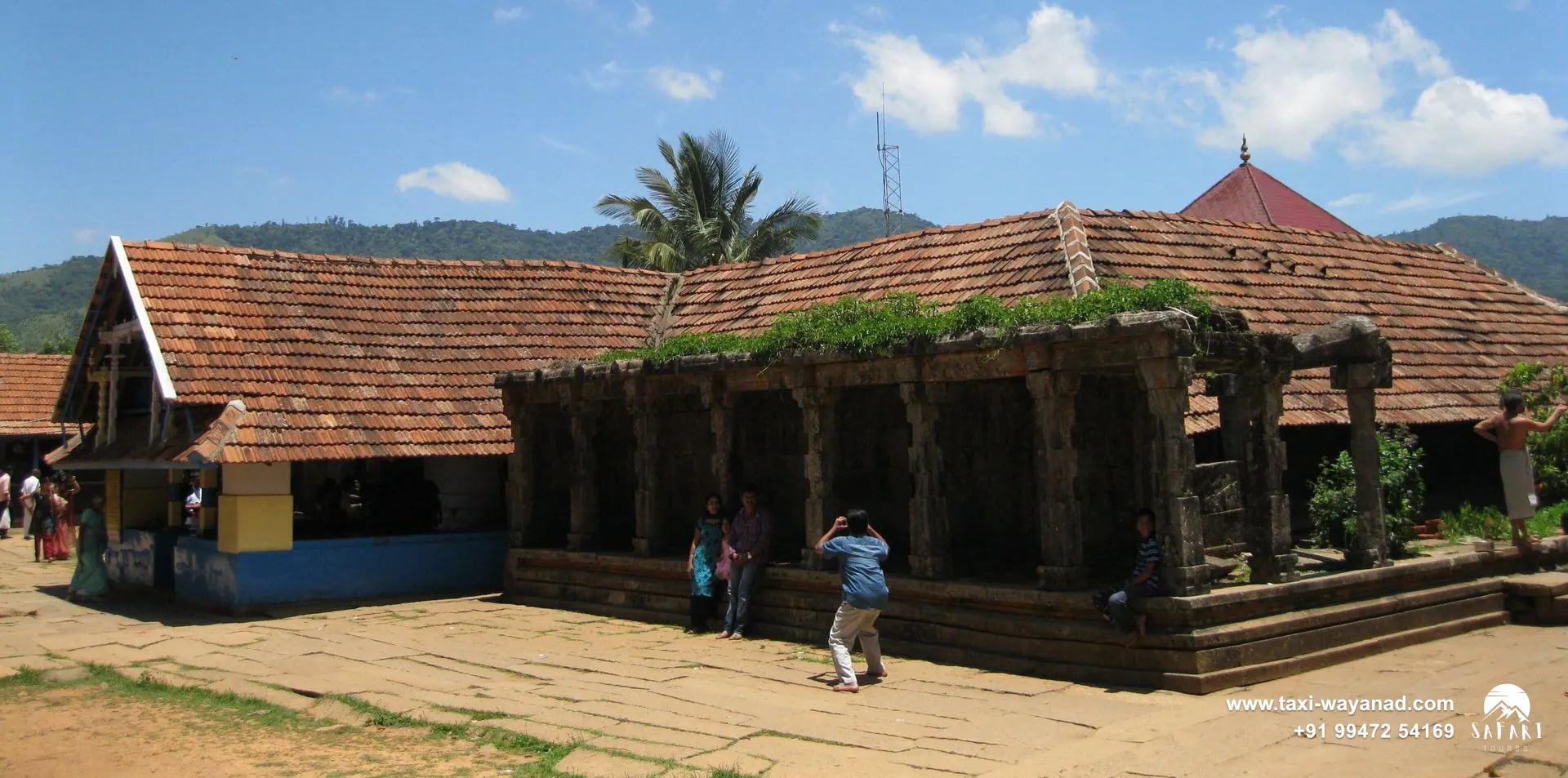 Sloping tiled roofs and stone pillared hall of Thirunelli Temple, Wayanad
